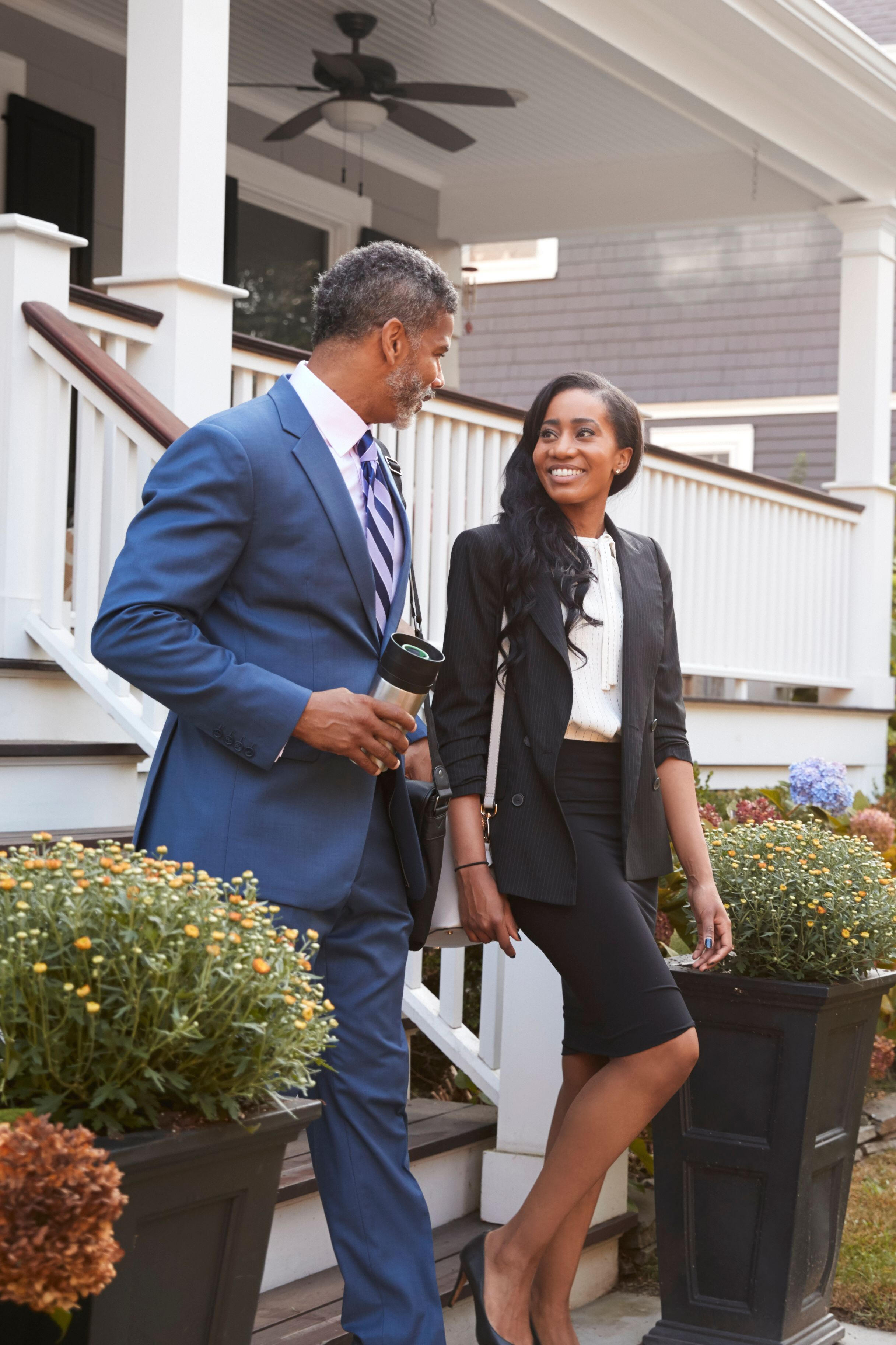 Two Realtors leaving a property